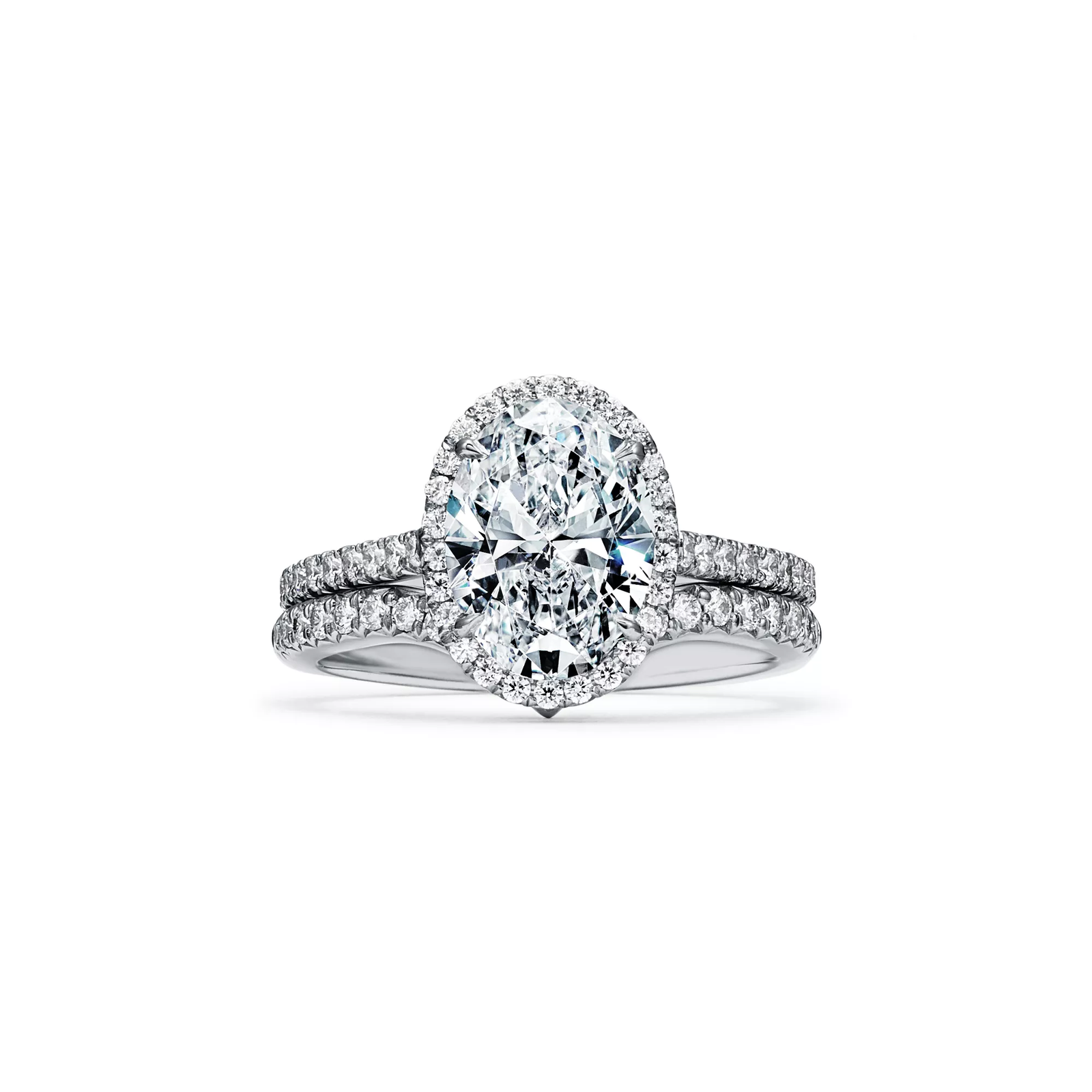 Oval Halo Engagement Ring with a Diamond Platinum Band