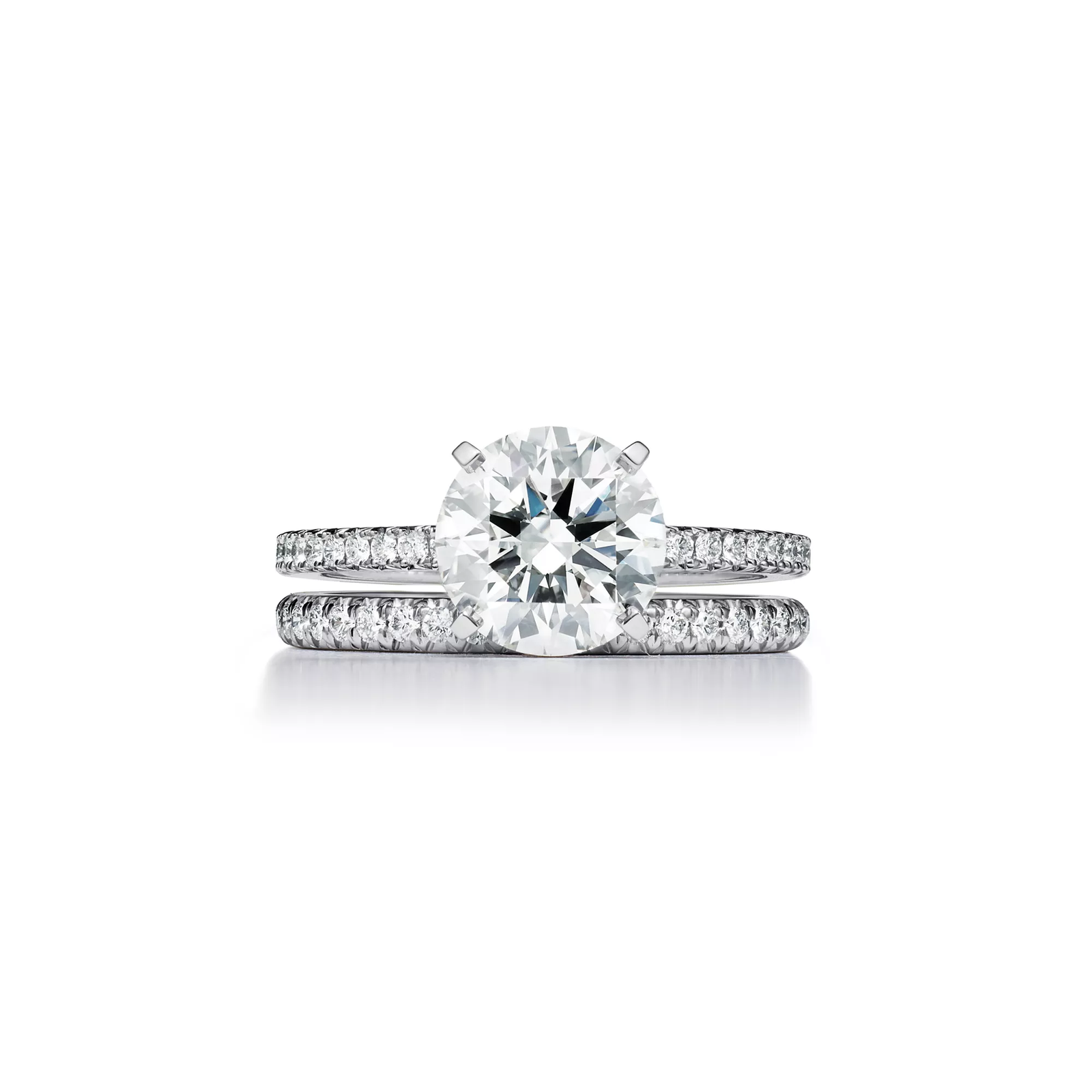 Engagement Ring with a Round Brilliant Diamond and a Platinum Diamond Band