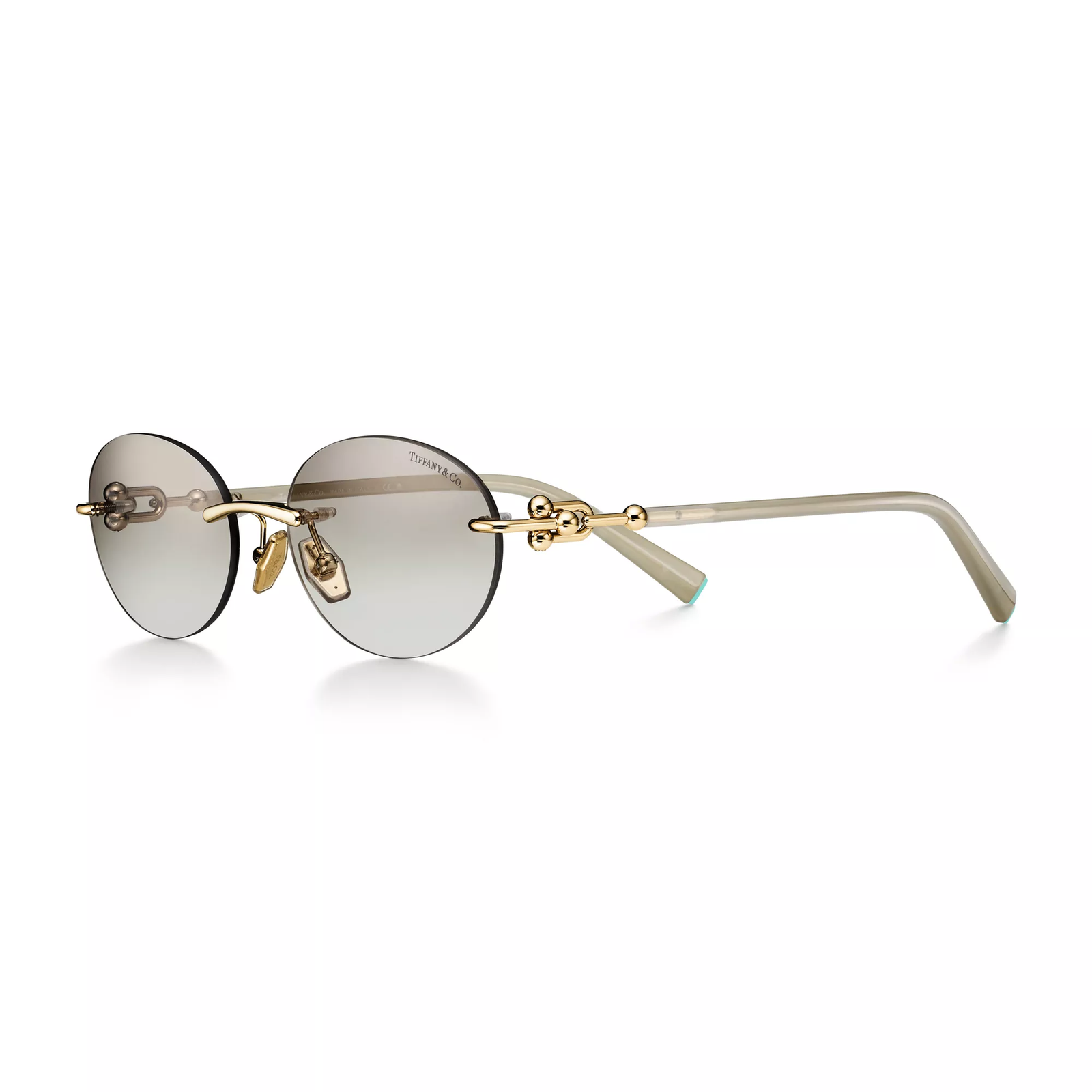 Sunglasses in Pale Gold-colored Metal